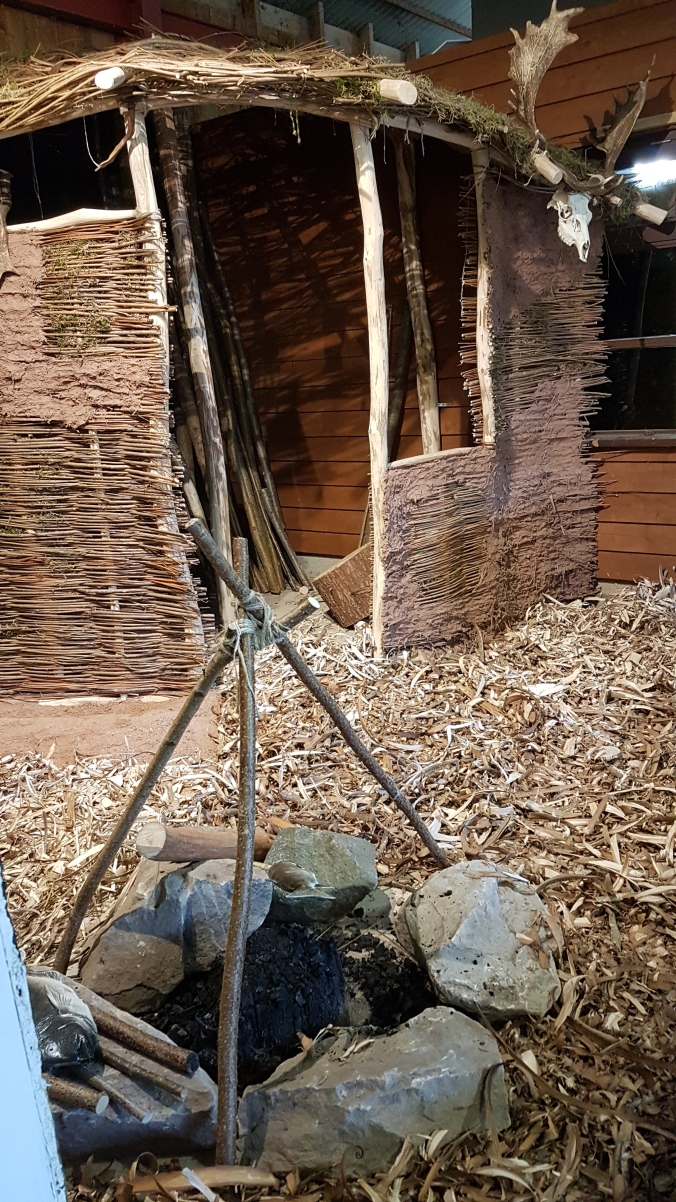 exhibition of replica hut and fire pit