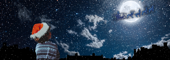 a child wearing a santa hat gazing up at silhouette of sleigh and reindeer flying infront of bright moon